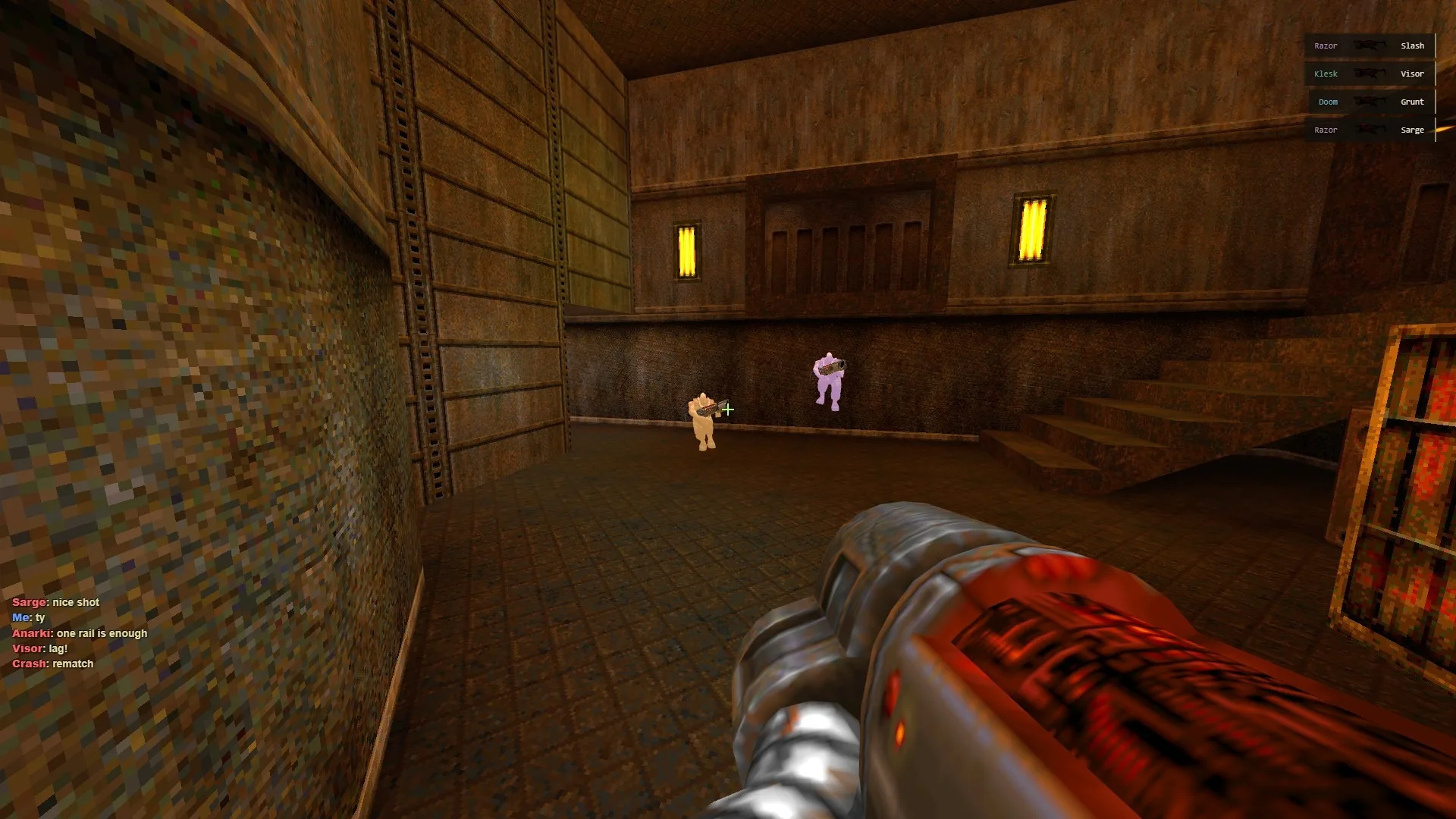 Two opponents in a lit hall while the chat trades remarks after a frag